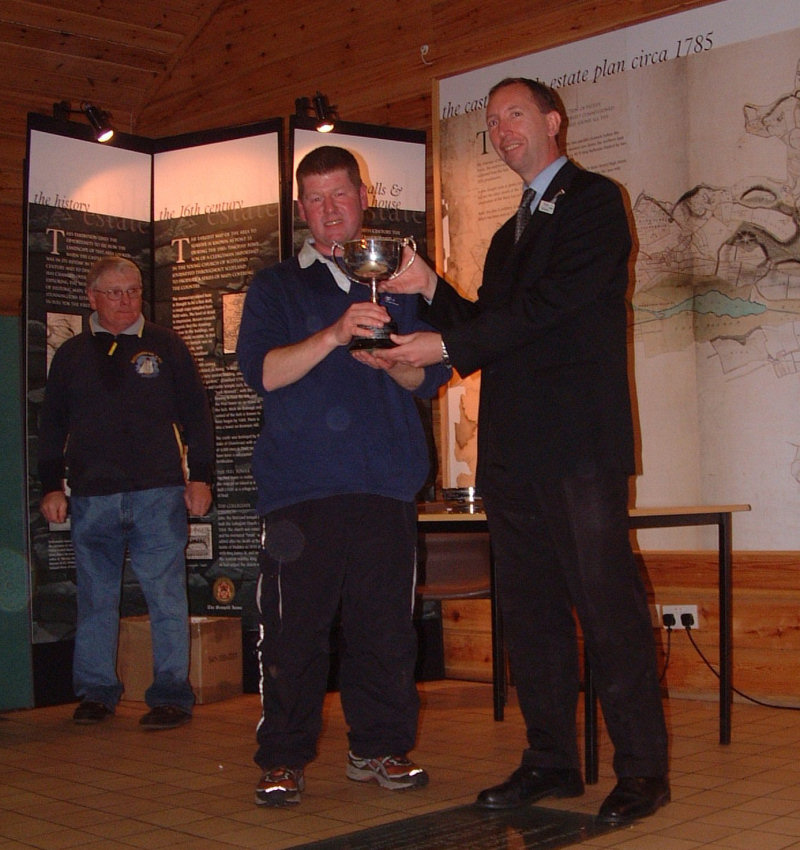 Martin receiving the Championship trophy from Charles Woodward at the One Metre nationals photo copyright MYA taken at  and featuring the One Metre class