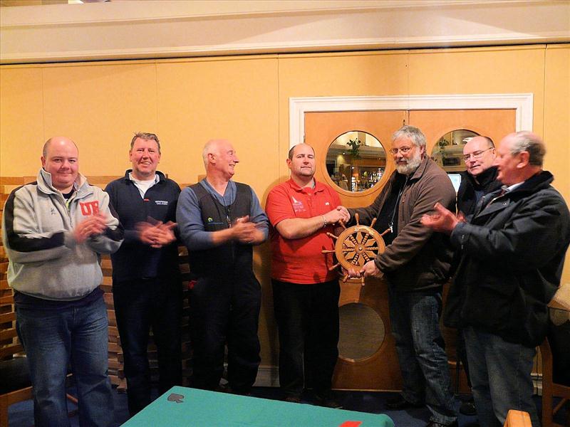 RO Gordon Davies presenting winner Gilbert Louis with the Howth YC IOM Perpetual Trophy photo copyright Bill Scott taken at Howth Yacht Club and featuring the One Metre class