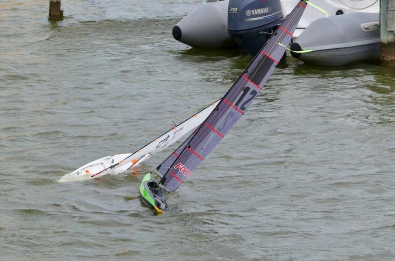 Day 3 – Puffy breezes created thrills and spills – Goolwa Regatta Week photo copyright Chris Caffin taken at Goolwa Regatta Yacht Club and featuring the One Metre class