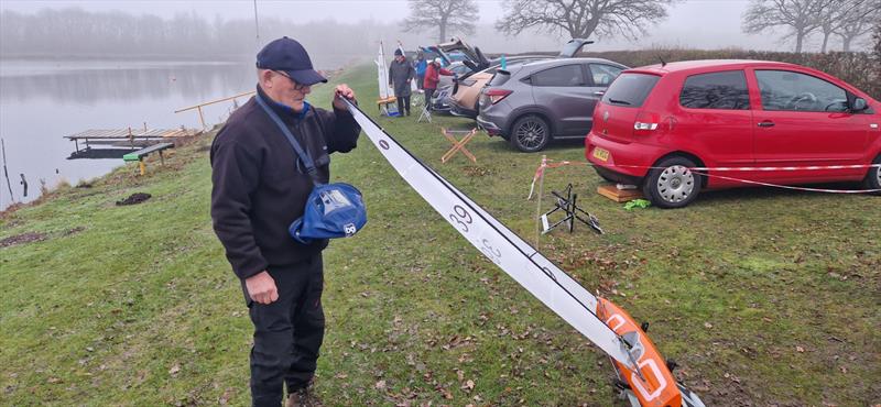 Lincoln I.O.M Winter Series Round 6 - Mick Cooper checking mast rake photo copyright Mick Chamberlain taken at Lincoln Radio Sailing Club and featuring the One Metre class