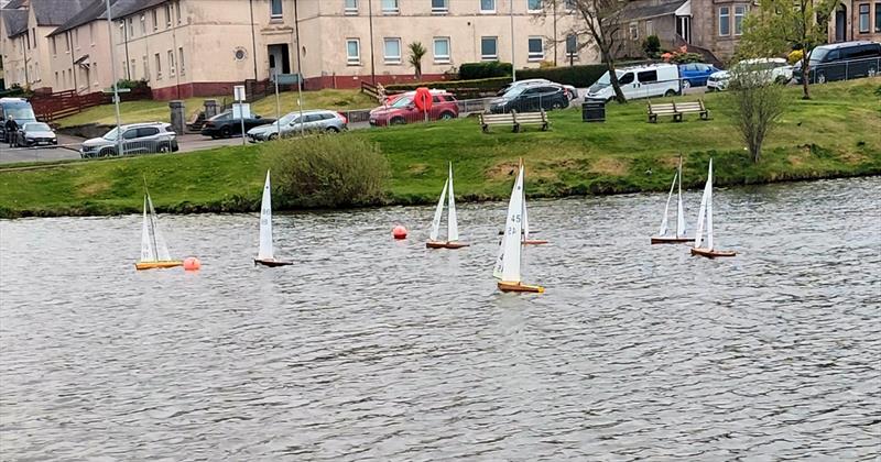 2026 MYA Scottish District Wooden Hull IOM Championship photo copyright Gordon Allison taken at Greenock Model Yacht and Power Boat Club and featuring the One Metre class