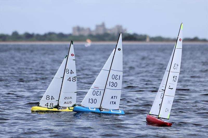 2026 IOM Worlds at Datchet Water Day 4 - AUS 48, ITA 130, CHI 13 in front of Windsor Castle photo copyright Mark Jardine taken at Datchet Water Sailing Club and featuring the One Metre class