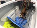 The seating inside a racing 2.4m class keelboat can be very simple if the helm is OK with that - tiller can be seen in centre at chest height © Magnus Smith / YachtsandYachting.com