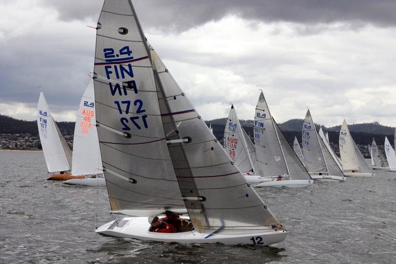 Veikko Martin (FIN) tacks away from the fleet on the River Derwent photo copyright Angus Calvert taken at Royal Yacht Club of Tasmania and featuring the 2.4m class