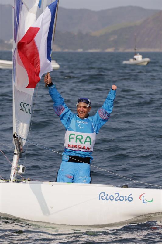 Seguin celebrates gold at the Rio 2016 Paralympic Sailing Competition photo copyright Richard Langdon / Ocean Images taken at  and featuring the 2.4m class