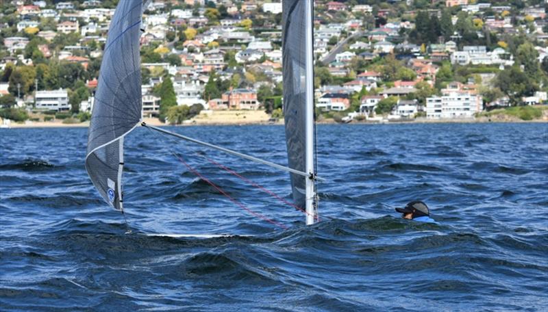 Lisa Blackwood is not sinking….just submerged behind a large wave from a passing powerboat on the Derwent photo copyright Jane Austin taken at Royal Yacht Club of Tasmania and featuring the 2.4m class