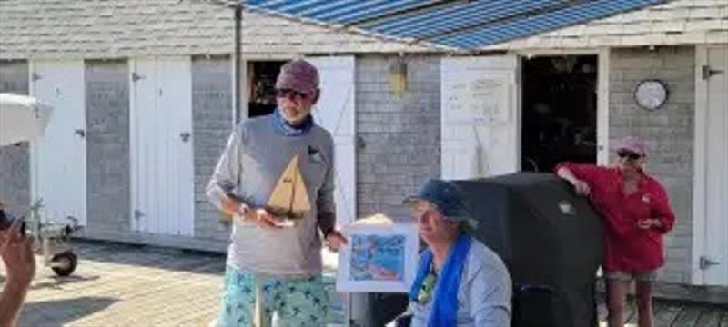 Mr. Green gets a first place trophy after building a picket fence photo copyright Michelle Seepe taken at Sandy Bay Yacht Club and featuring the 2.4m class