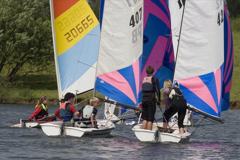 A group of juniors approaching the final mark in the third race at the Notts County SC Junior event photo copyright David Eberlin taken at Notts County Sailing Club and featuring the 405 class