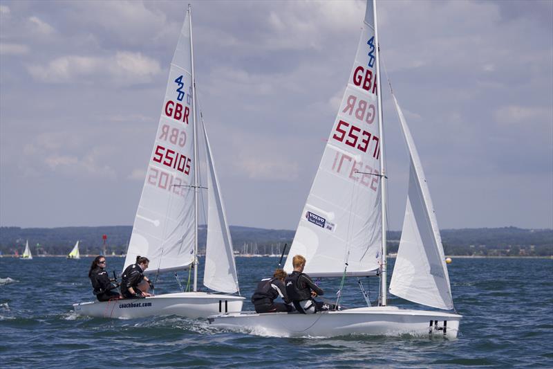 Henry Heath with James Dickinson leads Emily Heath with Hannah Jone in the 420s during Junior Fortnight at Itchenor photo copyright Mary Pudney taken at Itchenor Sailing Club and featuring the 420 class