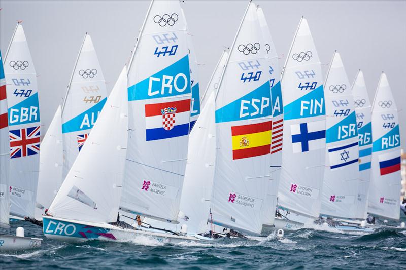 Men's 470 racing on day five of the London 2012 Olympic Sailing Competition photo copyright Tom Gruitt / www.tom-gruitt.co.uk taken at Weymouth & Portland Sailing Academy and featuring the 470 class