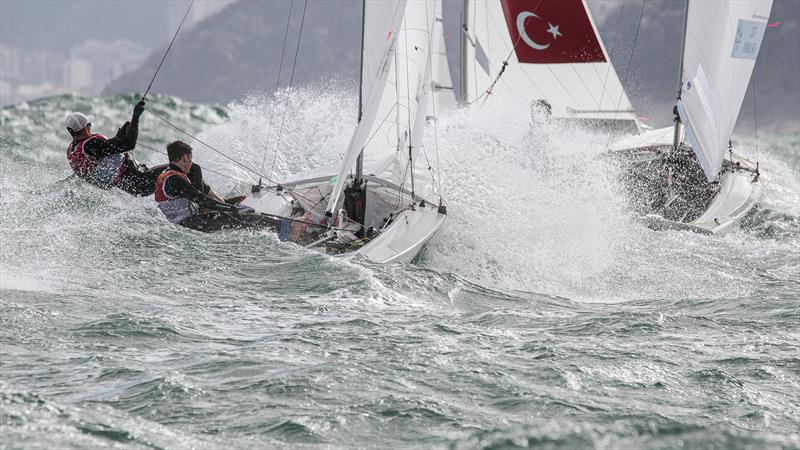 The NZ mens 470 bursts through a wave - Day 4,  2016 Olympic Regatta photo copyright Richard Gladwell / Sail-World.com taken at Iate Clube do Rio de Janeiro and featuring the 470 class