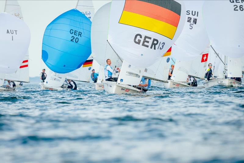 Three Germans with Malte and Anastasiya Winkel (GER 13) in front are leading the 470s before the medal race at Kiel Week photo copyright Sascha Klahn / Kieler Woche taken at Kieler Yacht Club and featuring the 470 class