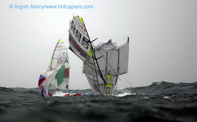 An amazing pitch pole for Stevie Morrison & Ben Rhodes in the 49er medal race at the 2008 Olympic Sailing Regatta photo copyright Ingrid Abery / www.hotcapers.com taken at  and featuring the 49er class