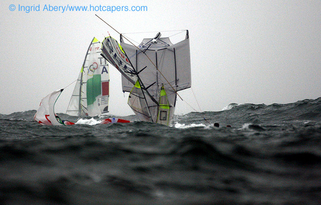 An amazing pitch pole for Stevie Morrison & Ben Rhodes in the 49er medal race at the 2008 Olympic Sailing Regatta photo copyright Ingrid Abery / www.hotcapers.com taken at  and featuring the 49er class