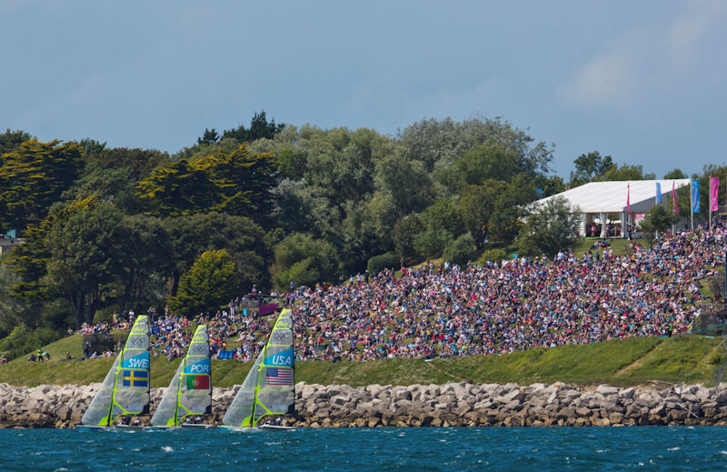 49er racing in front of the spectators at the London 2012 Olympic Sailing Competition photo copyright Daniel Forster / www.go4image.com taken at Weymouth & Portland Sailing Academy and featuring the 49er class