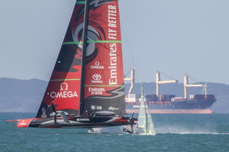 Austrian 49er crosses ETNZ's AC75  while  training on the Waitemata Harbour ahead of the 2019 World Championships. The 49er, 49erFX and Nacra 17 World Championships get underway in four weeks photo copyright Richard Gladwell taken at Takapuna Boating Club and featuring the 49er class