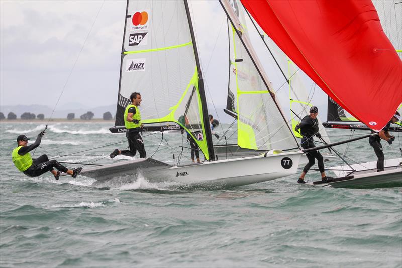 Logan Dunning Beck yells his congratulations to Peter Burling and Blair Tuke just after the two Kiwi crews cross the finsih line in the Medal Race - Hyundai Worlds. December 2019 photo copyright Richard Gladwell / Sail-World.com taken at Royal Akarana Yacht Club and featuring the 49er class