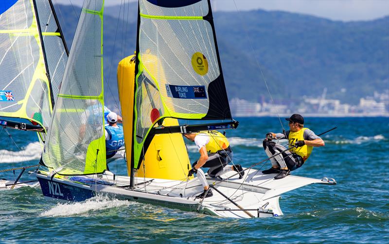 Peter Burling and Blair Tuke (NZL) - Silver medalists - 49er - chase the Gold medalists Fletcher and Bithell (GBR) - Tokyo2020 - photo © Sailing Energy