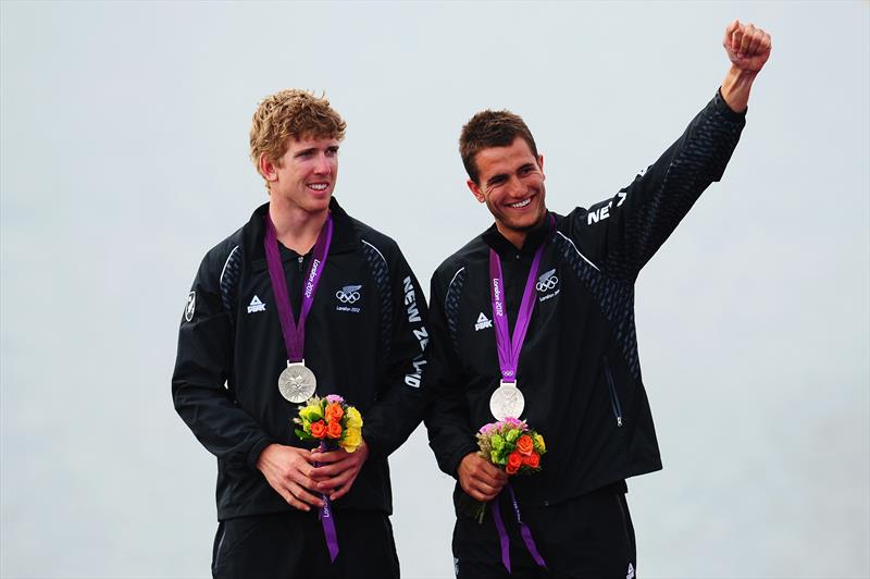 Peter Burling (L) and Blair Tuke (R)  celebrate winning silver in the Men's 49er Sailing, London 2012 Olympic Games at the Weymouth  photo copyright Getty Images taken at Weymouth & Portland Sailing Academy and featuring the 49er class