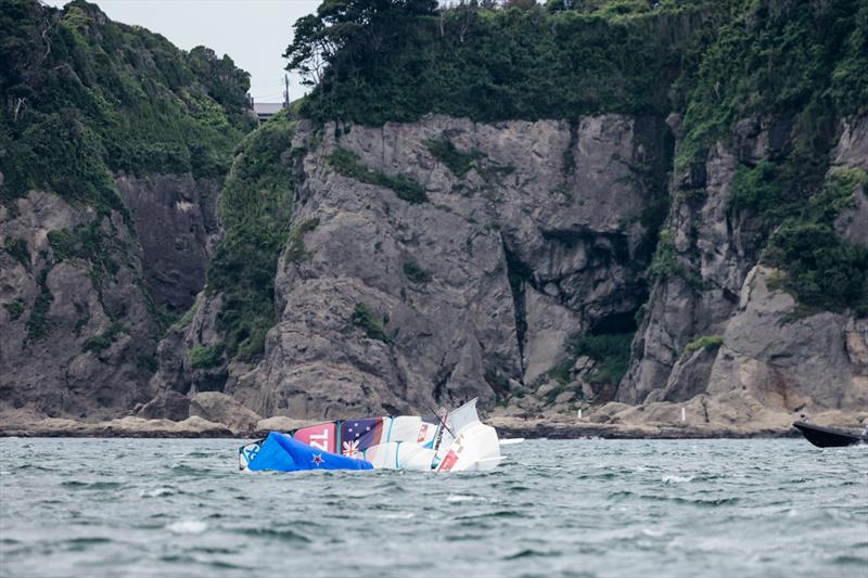 A capsize for Alexandra Maloney Molly Meech in the Women's 49erFX fleet on Tokyo 2020 Olympic Sailing Competition Day 3 photo copyright Sailing Energy / World Sailing taken at  and featuring the 49er FX class