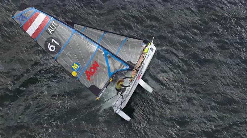 Austrian 49erFX crew auto-capsize after their boat was backwinded and blown over  in the Medal Race - Hempel Sailing World Championships, Aarhus, Denmark - Day 10, August 11, 2018 photo copyright Sailing Energy taken at  and featuring the 49er FX class