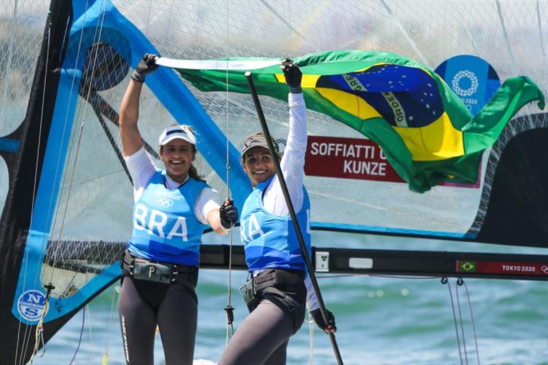 Kahena Kunze with Martine Grael (BRA) celebrate defending their Gold medals. photo copyright Sailing Energy / World Sailing taken at  and featuring the 49er FX class