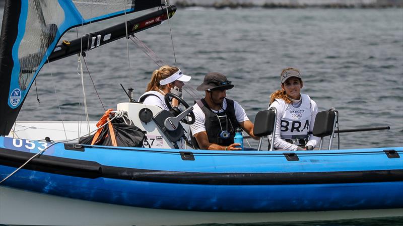 2016 Olympic Gold medalists in the 49erFX, Martine Grael and Kahena Kunze (BRA) talk with their coach, pre-race - Tokyo2020 - Day 7- July, 31, - Enoshima, Japan photo copyright Richard Gladwell - Sail-World.com/nz taken at  and featuring the 49er FX class
