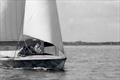 A very rare picture of Coronet, the boat that would go on to become the 5o5, sailing on Chichester Harbour close by Hayling Island Sailing Club. The boat featured many innovations (note the deep section ‘speed boom' and the mainsail cut)