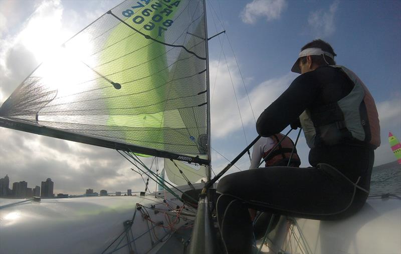 Gliding down to the bottom mark, Thomas Funke concentrates on flying his spinnaker during a regatta held in Durban photo copyright Sophie Thompson taken at  and featuring the 505 class