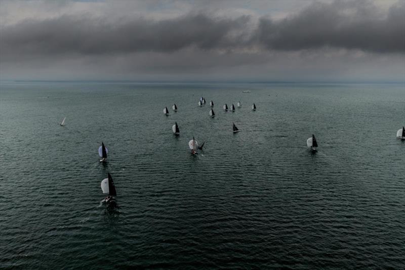 The fleet under leaden skies on day four of the 2025 International Six Metre World Championship photo copyright SailingShots by Maria Muiña taken at Seawanhaka Corinthian Yacht Club and featuring the 6m class