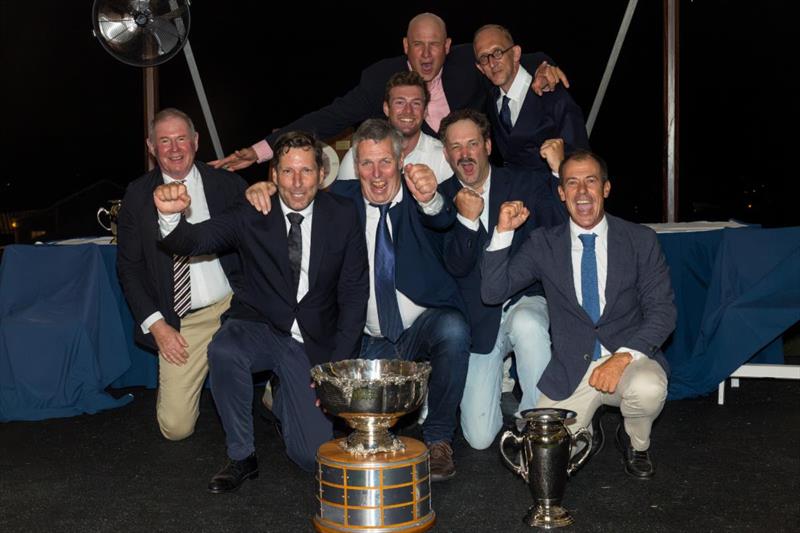 Dieter Schoen (L) and Team Momo II receive the 2025 International Six Metre Open World Championship trophies - photo © SailingShots by Maria Muiña