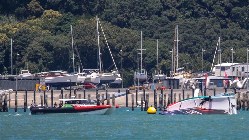 16. Chase boat moves in to start righting - Emirates Team NZ -  AC40-1|LEQ12 - January 23, 2023 - Waitemata Harbour photo copyright Richard Gladwell - Sail-World.com/nz taken at Royal New Zealand Yacht Squadron and featuring the AC40 class