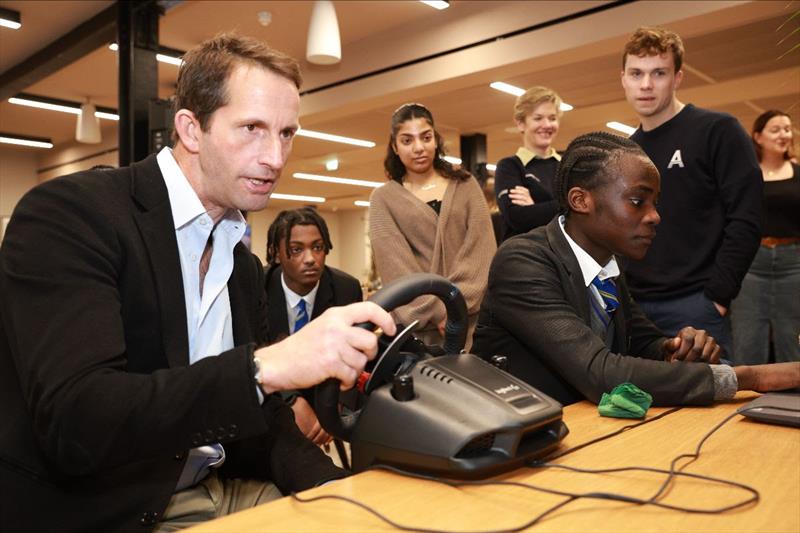 Sir Ben Ainslie and students from The Greig Academy use the Athena Pathway simulator at the launch event photo copyright London, UK taken at  and featuring the AC40 class