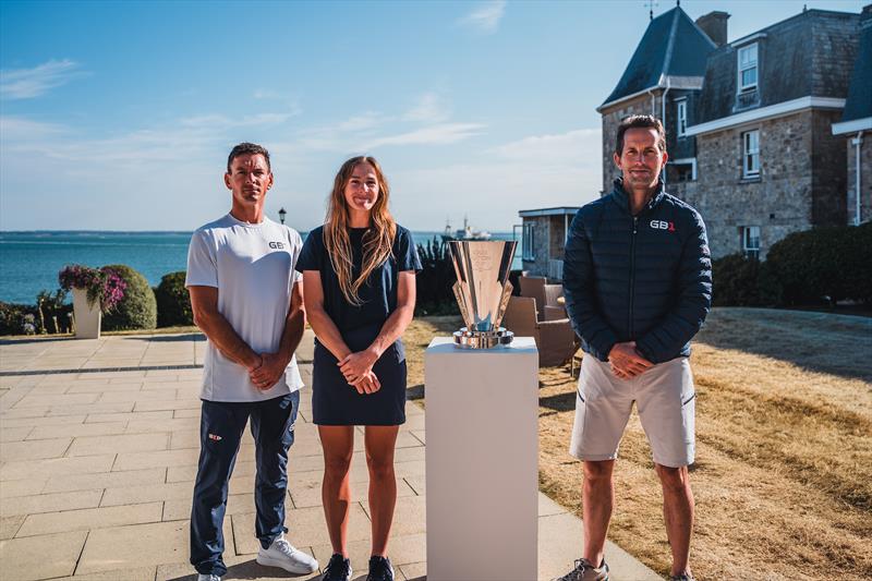 Dylan Fletcher MBE, Jemima Lines and Sir Ben Ainslie with the Louis Vuitton Cup, which was won by the British America's Cup Team at the 37th America's Cup in Barcelona in 2024 photo copyright Jackson Green taken at Royal Yacht Squadron and featuring the AC40 class