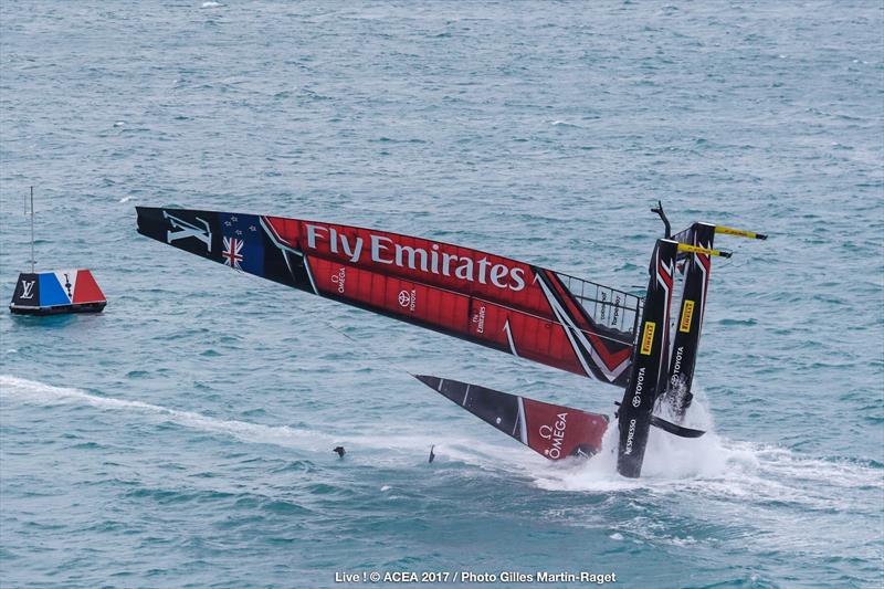 Emirates Team New Zealand capsize on the second day of the Louis Vuitton America's Cup Challenger Playoffs photo copyright ACEA 2017 / Gilles Martin-Raget taken at  and featuring the AC50 class