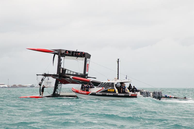 Emirates Team New Zealand capsize on the second day of the Louis Vuitton America's Cup Challenger Playoffs photo copyright Richard Hodder / ETNZ taken at  and featuring the AC50 class