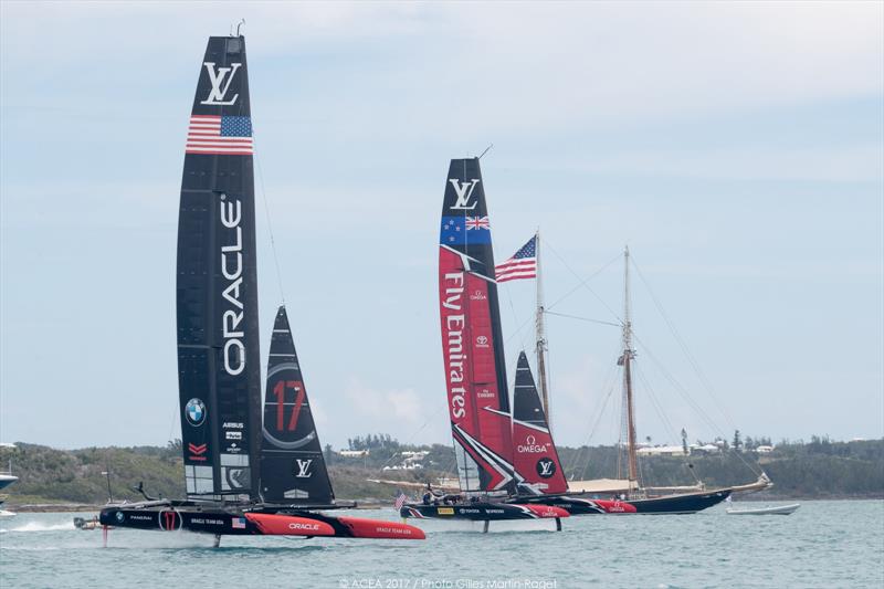 Tight racing between ORACLE TEAM USA and Emirates Team New Zealand on day 3 of the 35th America's Cup Match photo copyright ACEA 2017 / Gilles Martin-Raget taken at  and featuring the AC50 class