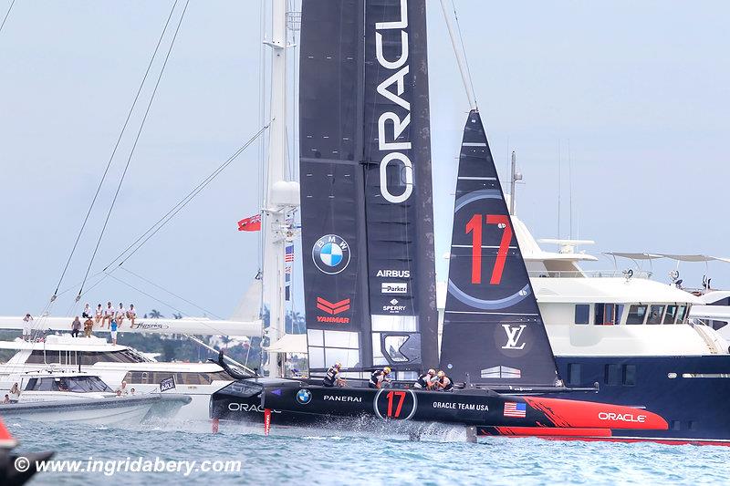 Tight racing between ORACLE TEAM USA and Emirates Team New Zealand on day 3 of the 35th America's Cup Match photo copyright Ingrid Abery / www.ingridabery.com taken at  and featuring the AC50 class