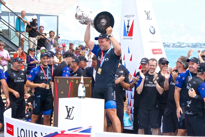 Simon van Velthooven - hoists the America's Cup high - an experience few sailors have in their life times photo copyright Richard Gladwell taken at  and featuring the AC50 class