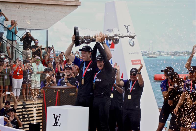 Peter Burling and Glenn Ashby hold the America's Cup aloft in Bermuda, June 26, 2017 photo copyright Richard Gladwell taken at  and featuring the AC50 class
