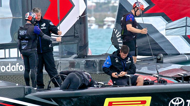 Peter Burling head down - Repairs after Race 4 - Finals, America's Cup Playoffs- Day 15, June 11, 2017 (ADT) photo copyright Richard Gladwell taken at  and featuring the AC50 class
