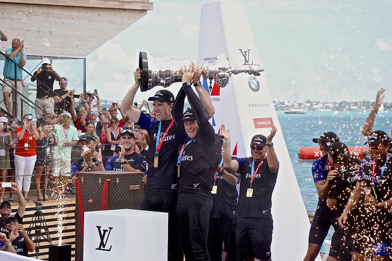 Peter Burling and Glenn Ashby lift the America's Cup for the first time (there was no handover from Golden Gate YC or Oracle Team USA) photo copyright Richard Gladwell taken at  and featuring the AC50 class