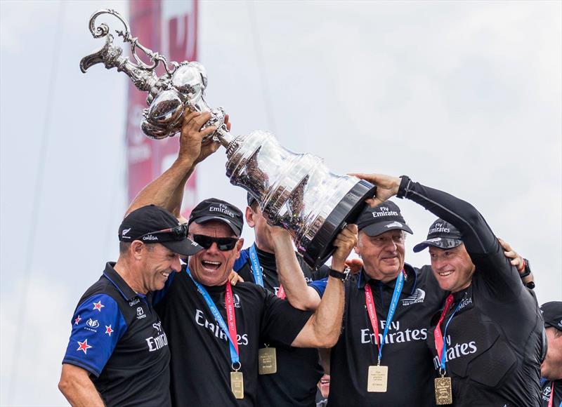 Kevin Shoebridge, Grant Dalton, Matteo di Nora and Glenn Ashby with the America's Cup in Bermuda photo copyright Emirates Team New Zealand taken at Royal New Zealand Yacht Squadron and featuring the AC50 class