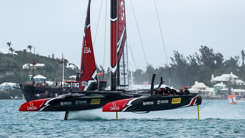 Emirates Team NZ emerges out of the murk in Bermuda at the end of the final race of Day 1 of the Challenger Finals - Bermuda, June 10, 2017 photo copyright Richard Gladwell - Sail-World.com/nz taken at Royal New Zealand Yacht Squadron and featuring the AC50 class