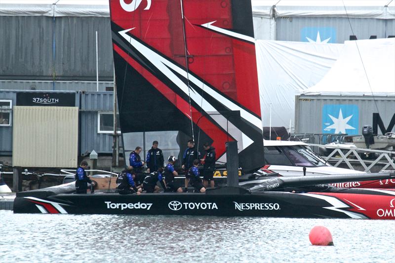 Emirates Team New Zealand's new AC50 is launched for the first time at the Team's base in Auckland. The crew are sitting on the new cycle grinder pedestals photo copyright Richard Gladwell taken at Royal New Zealand Yacht Squadron and featuring the AC50 class