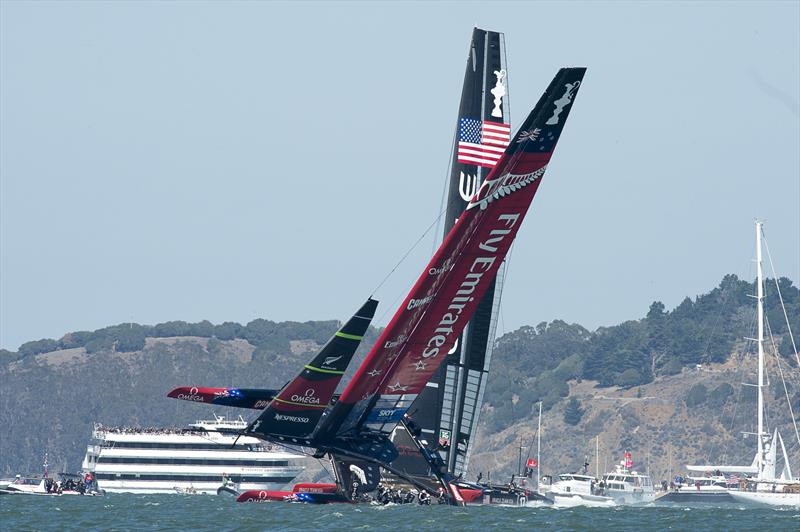Emirates Team New Zealand gets close to capsizing when hydraulics failed to push the wing through on a tack. Oracle Team USA take the lead on the beat during race 8 of the 34th America's Cup - photo © Chris Cameron / ETNZ