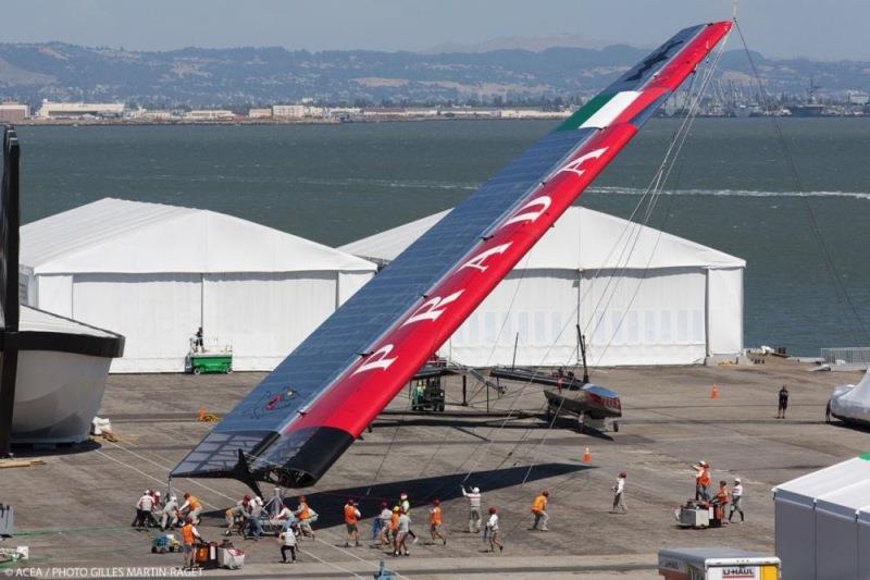 Luna Rossa attempting to raise and locate their wingsail on an AC72 photo copyright Gilles Martin-Raget taken at  and featuring the AC72 class