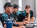 Nathan Outteridge, Sam Meech and coach Ray Davies in one of the first strategy meetings of the 38th America's Cup - Auckland - May 14, 2025 © Hamish Hooper / Emirates Team New Zealand