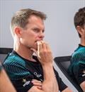 Chris Draper (GBR) in one of the first strategy meetings of the 38th America's Cup - Auckland - May 14, 2025 © Hamish Hooper / Emirates Team New Zealand