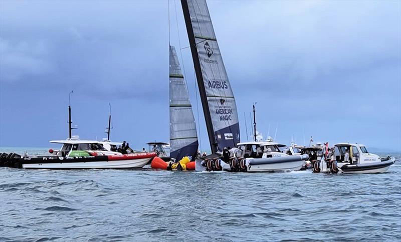 The America's Cup support teams work together to save NYYC American Magic's Patriot after a huge capsize on day 3 of the PRADA Cup - photo © Richard Gladwell / Sail-World.com